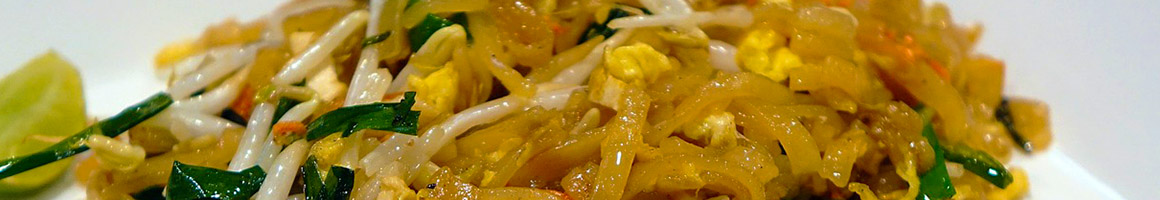 Eating Thai at Sticky Rice restaurant in New York, NY.